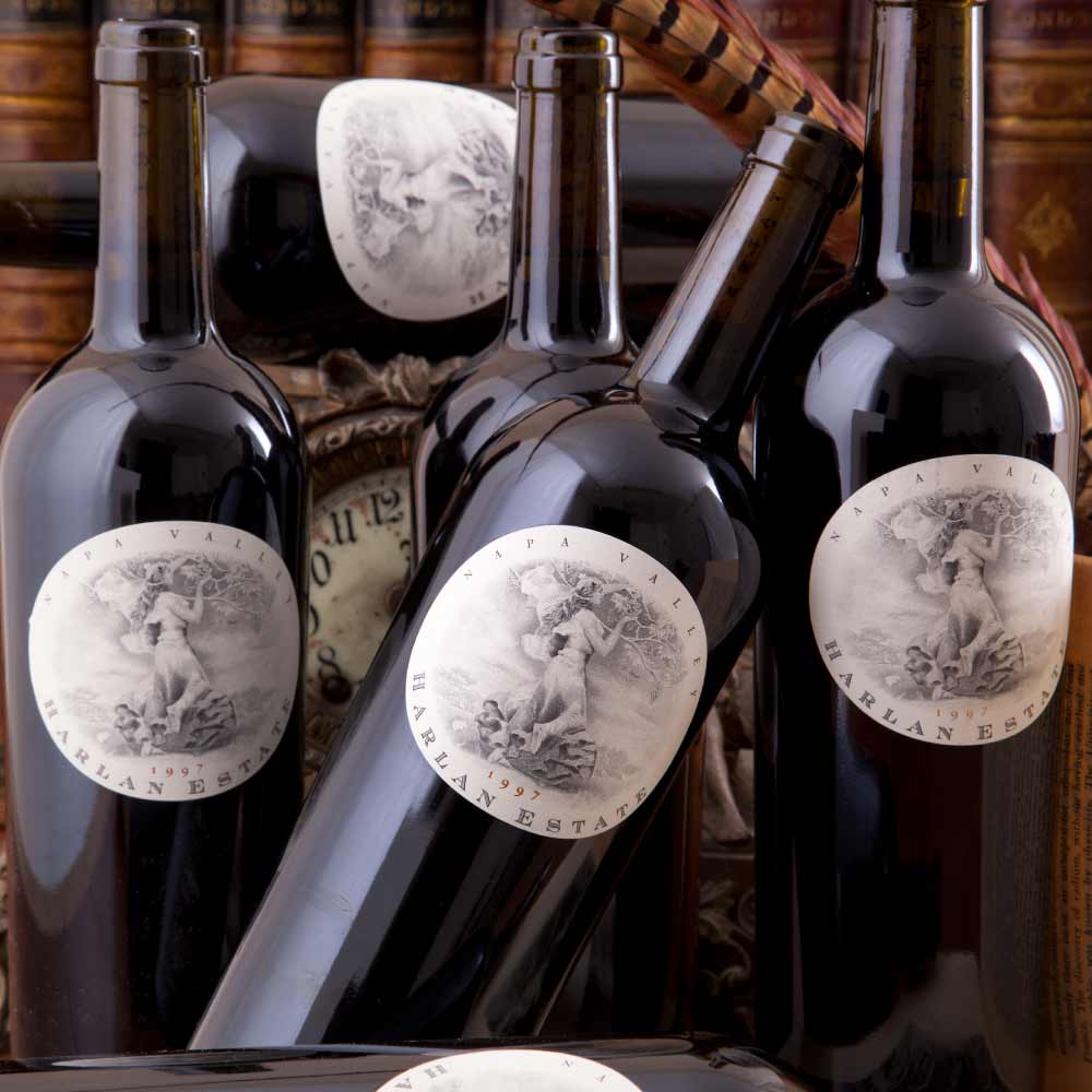 bottles of harlan estate all lined up